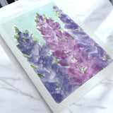 Hand-painted greeting card featuring dreamy lilac and blush tones with a watercolor sky, capturing soft, layered hues in a 5x7-inch original artwork