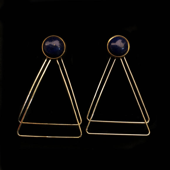 Image of lapiz lazuli earrings with two, thin gold plated, overlapping triangles underneath, on a black background.